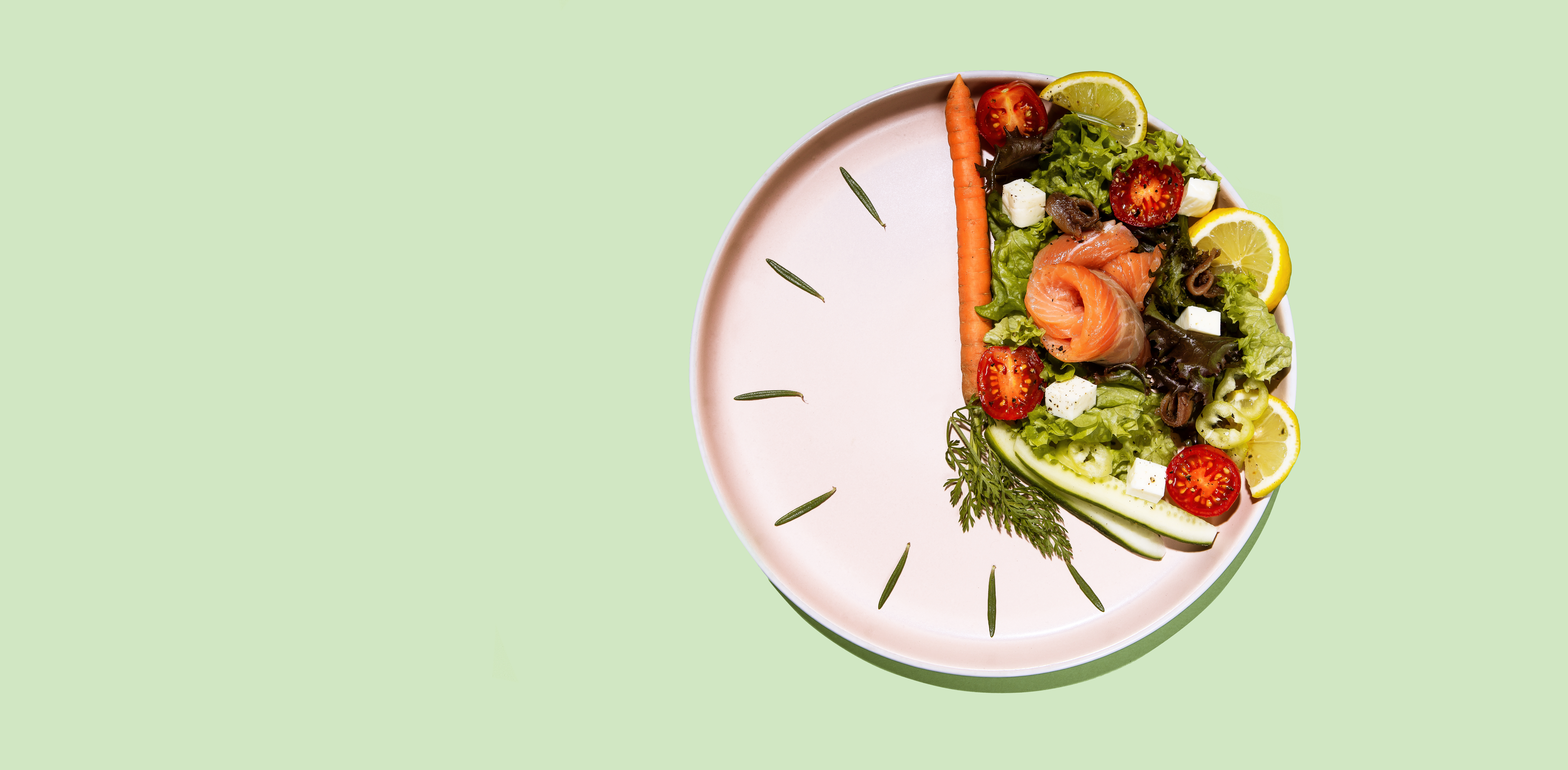 Intermittent fasting as a concept with a plate of vegetables organized as a clock