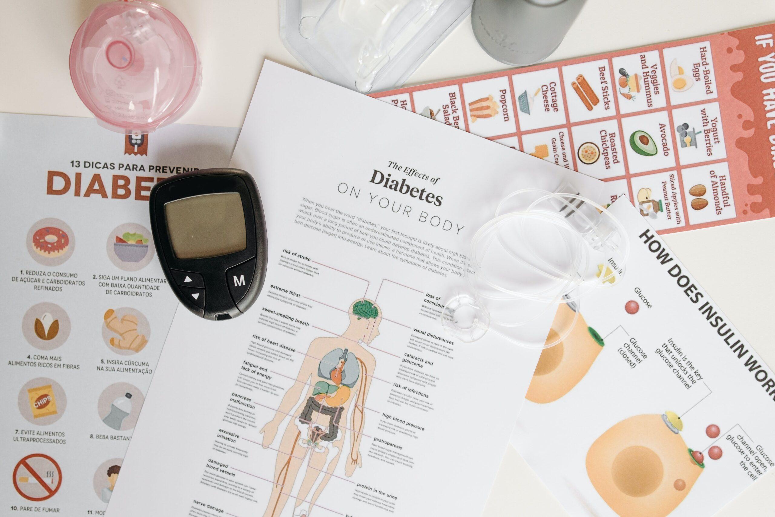 Glucose monitor and handouts discussing diabetes nutrition